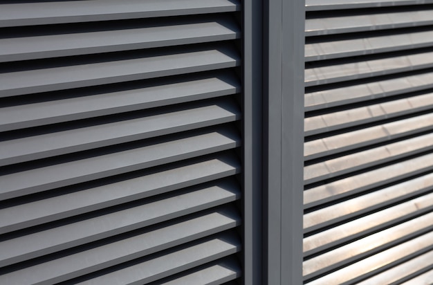 Roller metal shutters with sun light. Outdoor shot