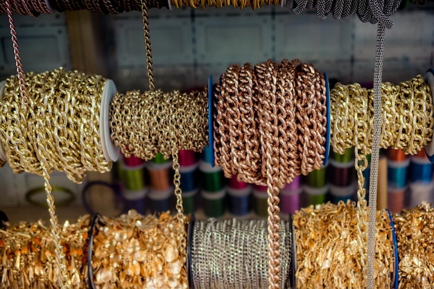 Rolls of colorful metal chains as a background