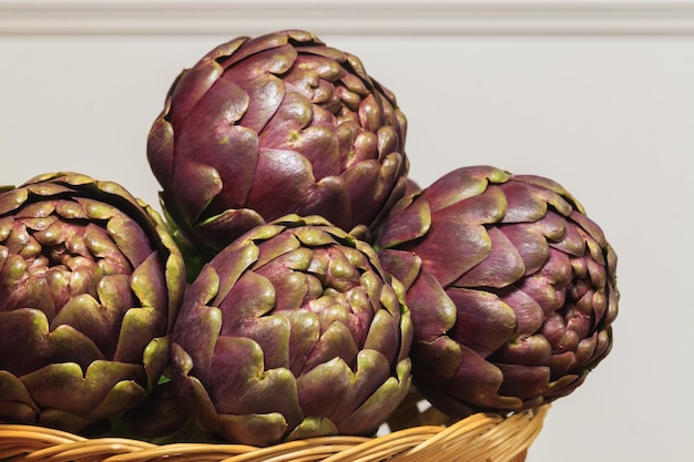 Roman ArtichokesCloseup shot of big Romanesco Artichokes also known as Roman Artichokes on a white background