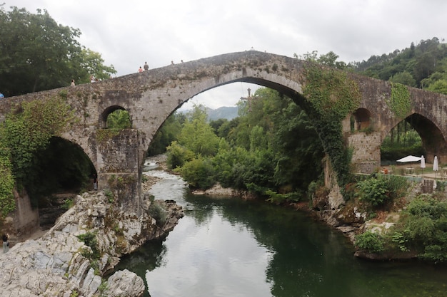 Roman Bridge of Cangas de Ons town in Asturias Spain