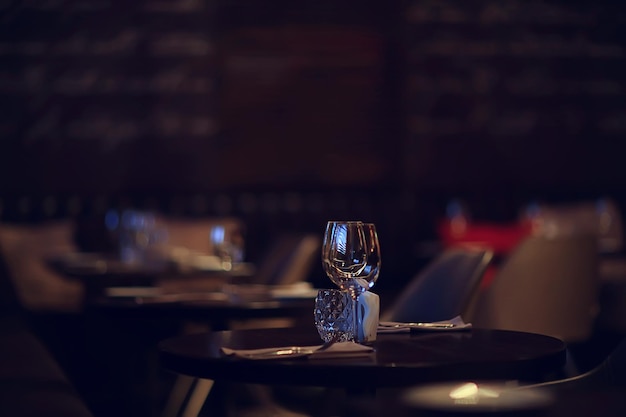 romance dinner restaurant table setting, background in abstract bar table food and wine