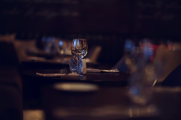 romance dinner restaurant table setting, background in abstract bar table food and wine