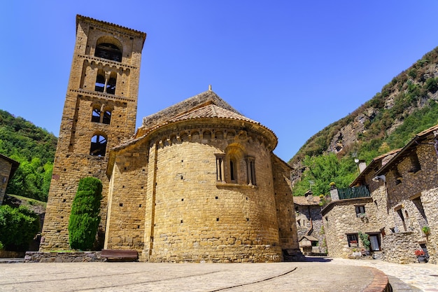 Romanesque church with bellfilled tower in the mountain village of Beget Catalonia Girona