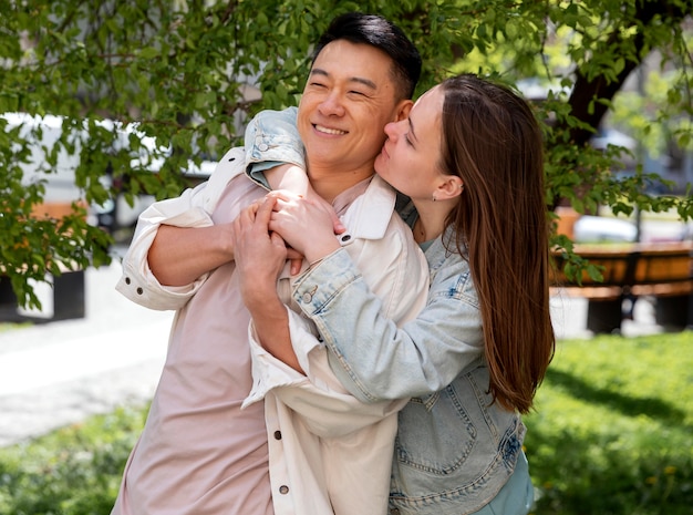 Romantic couple outdoors medium shot