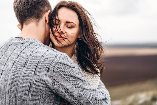 Romantic happy couple enjoy spending time together outdoor.