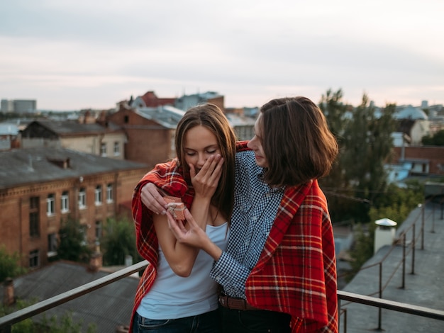 Romantic marriage proposal on the rooftop. Love proclamation, new family concept