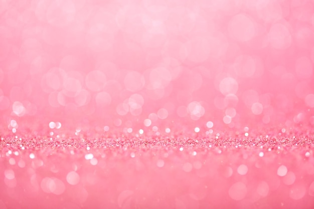 Romantic pastel pink defocused background with glitter sparkles and circle bokeh