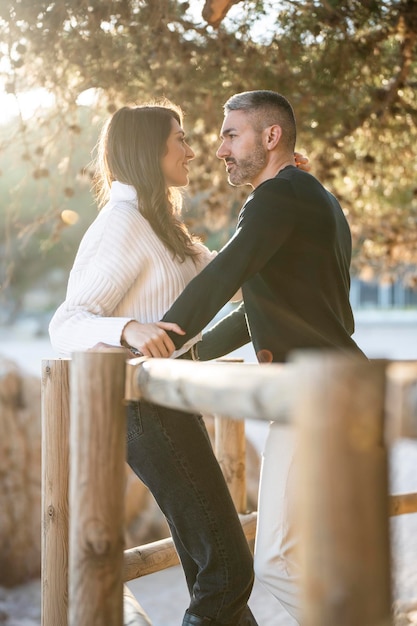 Romantic scene with a heterosexual couple looking each other