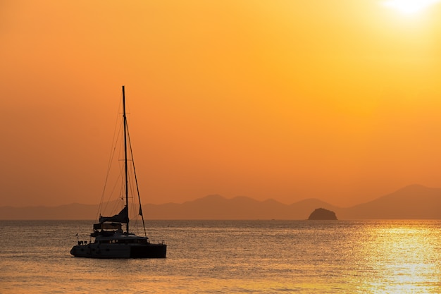 Romantic sunset on the shore of a tropical island. Koh Chang or Krabi Province. Thailand.