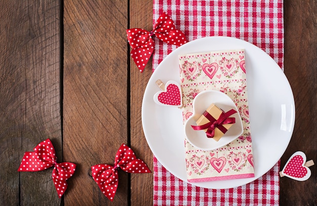 Romantic table setting for Valentines day in a rustic style. Top view