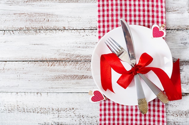 Romantic table setting for Valentines day in a rustic style. Top view