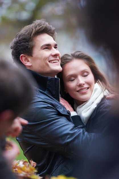 romantic young couple have fun in city park at autumn season