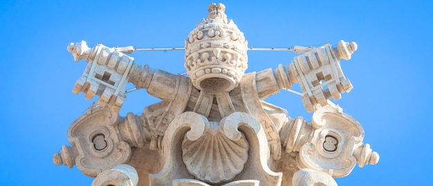 ROME, ITALY - CIRCA AUGUST 2020: antique Vatican symbol located in Saint Peter Square