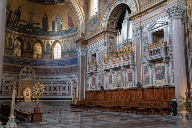 Rome, Italy - June 20, 2018: Panoramic view of interior of Lateran Basilica, also known as Papal Archbasilica of St. John. It is the cathedral church of Rome and serves as seat of the Roman Pontiff