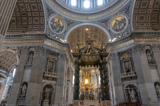 Rome, Italy - June 22, 2018: Panoramic view of interior of Papal Basilica of St. Peter (St. Peter's Basilica). It is an Italian Renaissance church in Vatican City, papal enclave within city of Rome