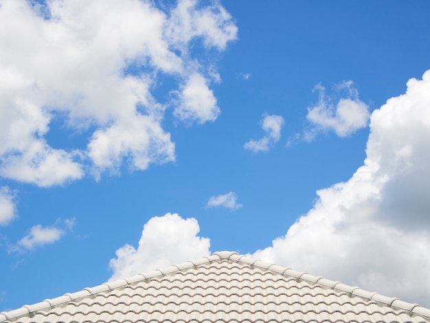 Roof of house under blue sky