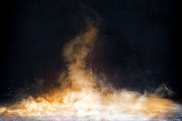 Room with concrete floor and smoke with fire sparks background