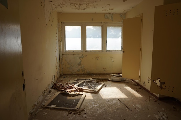 A room with a window and a door that says'the word'on it '