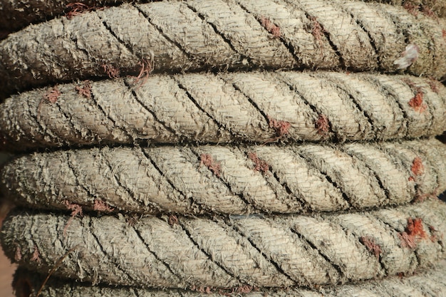 Rope texture on the wooden pole. 