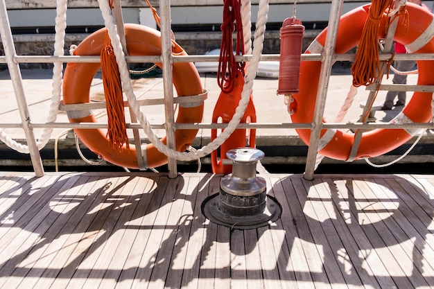 Ropes and life vests over a fisherman boat at Punta del Este harbour