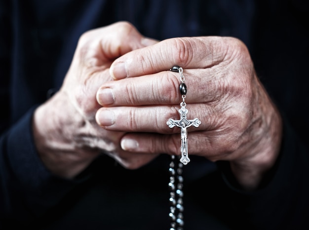 Rosary in a hand