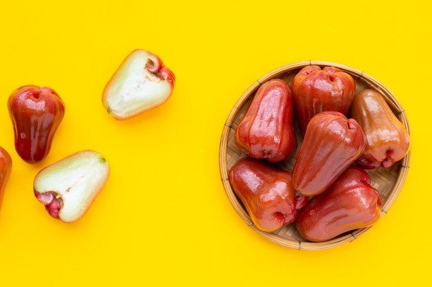 Rose apple on yellow background