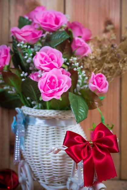 Rose flower on wooden background with space for art work