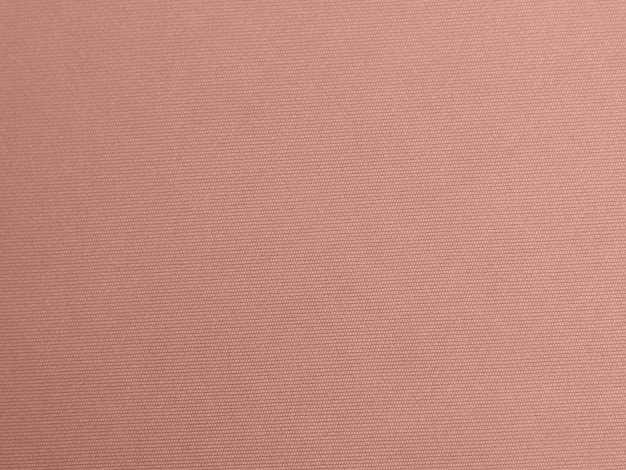 Rose gold color velvet fabric texture used as background Empty pink gold fabric background of soft and smooth textile material There is space for text