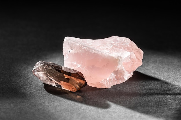 Rose Quartz and Smoky Quartz specimen on black