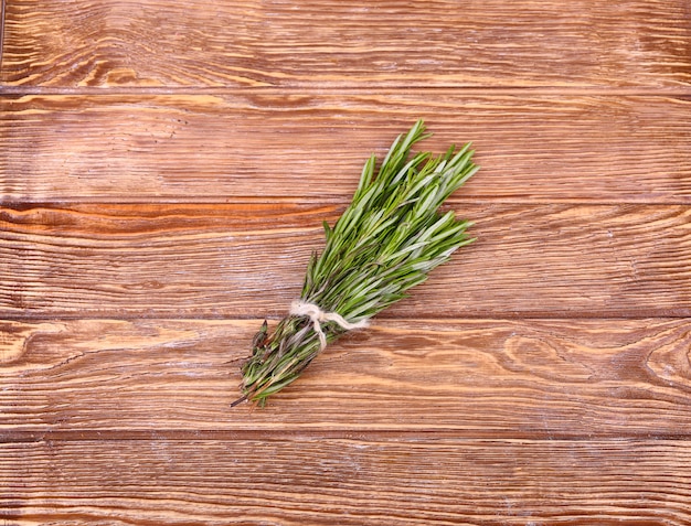 Rosemary bound on a wooden board