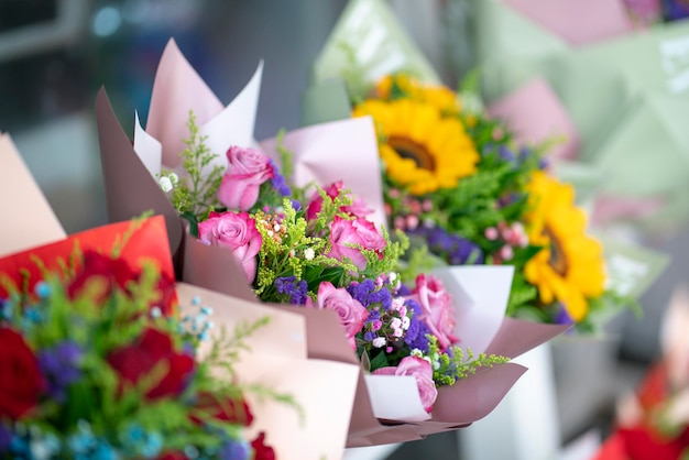 Roses and other flowers bouquet in a florist shop