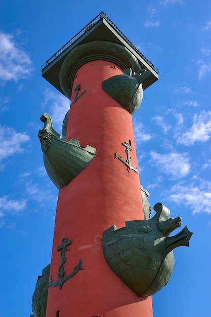 Rostral column on the Spit of Vasilievsky island against the blue sky