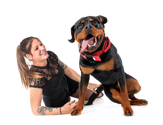 Rottweiler and woman in studio