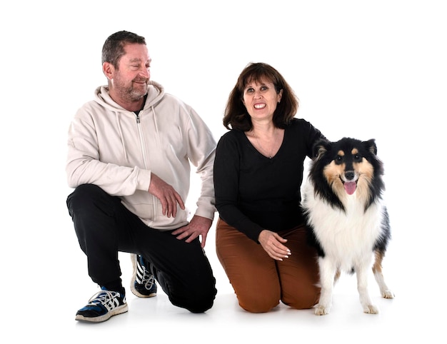 Rough collie and couple