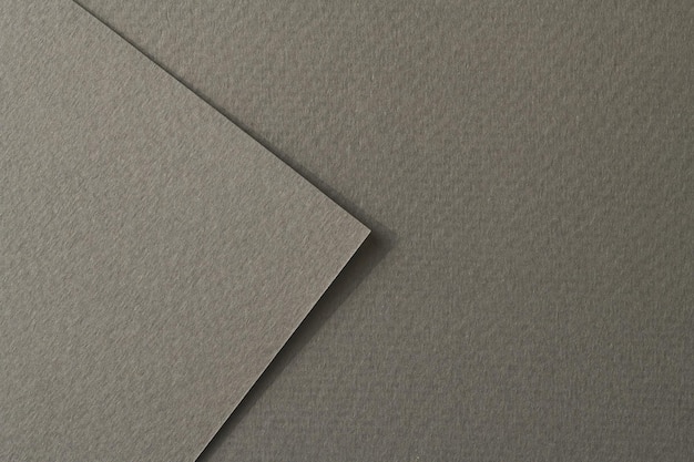 Rough kraft paper pieces background geometric monochrome paper texture gray color Mockup with copy space for text