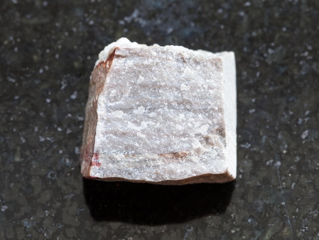 Rough Rhyolite stone on dark background