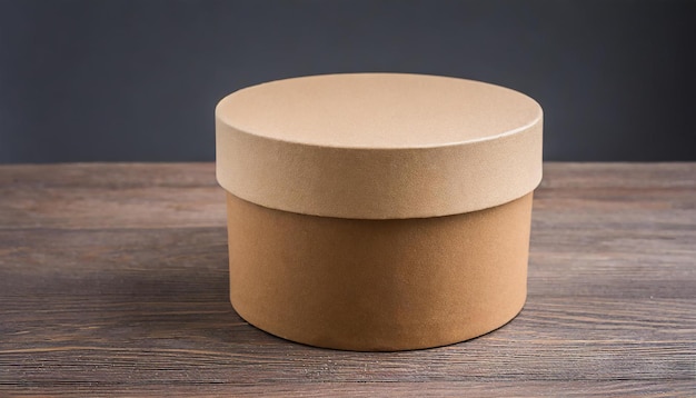 Round brown cardboard box on wooden table Mock up Packaging for delivery Eco package