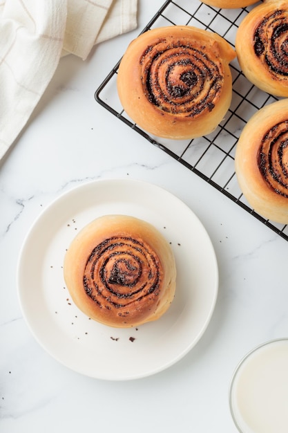 Round buns with poppy seeds