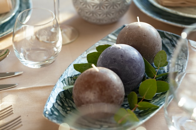 Round candles, beautiful table setting close up