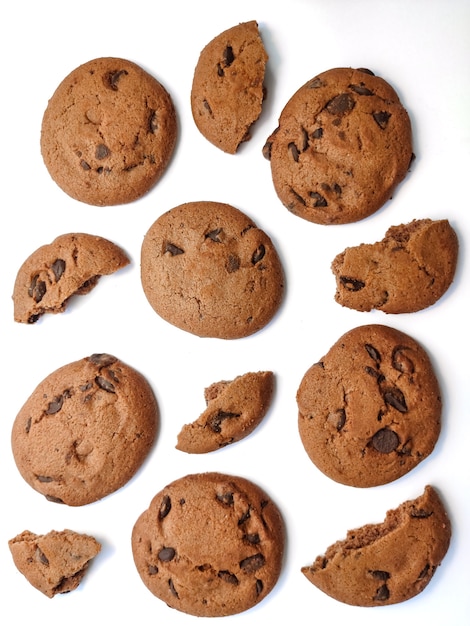 round chocolate biscuits with pieces of chocolate isolated lies on a white background