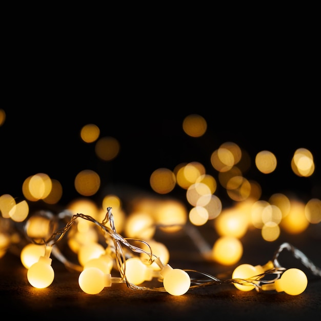 Round Christmas garland on dark background