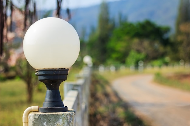 Round lamp in road background