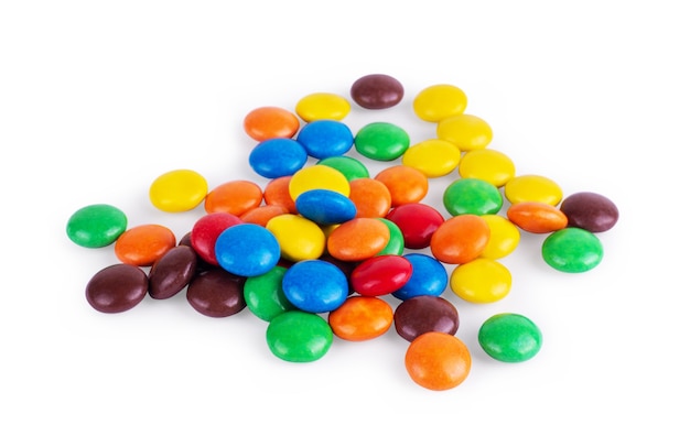 Round multicolored sweets on a white background