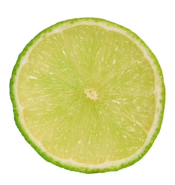 Round piece of juicy lime on a white isolated background