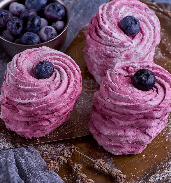 Round pieces of marshmallow with blueberries