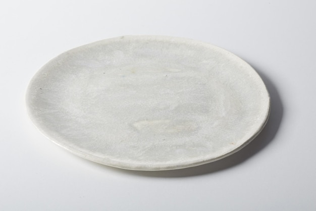 Round plate with marble ornament