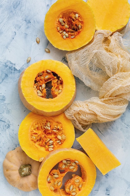 Round slices of pumpkin seeds and pieces of cloth