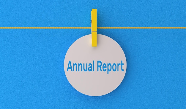 Photo a round white tag that says annual report on it.