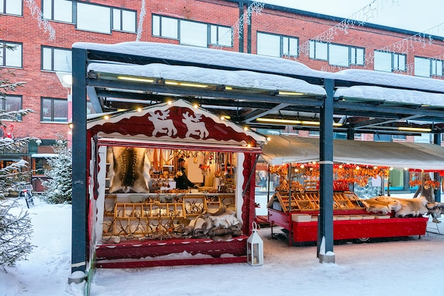 Rovaniemi, Finland - March 2, 2017: Street Market stall with traditional souvenirs at winter Rovaniemi, Lapland, Finland.