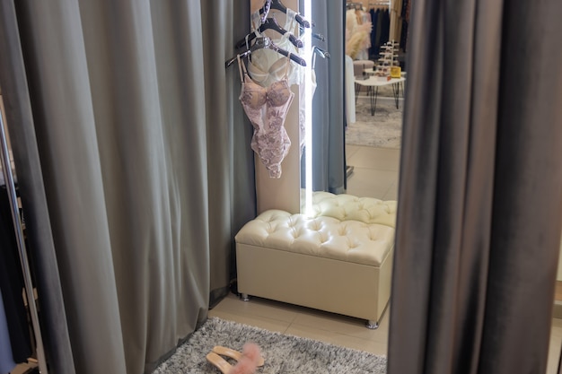 Row of bras hanging in lingerie store